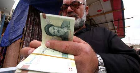 Iran's Rial Plummets to Record Low as Minister Admits Currency Crisis