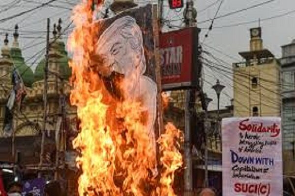 Fiery Protests Erupt in India as Demonstrators Torch Donald Trump Effigy!