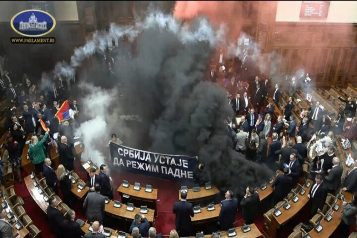 Serbian Parliament Erupts in Chaos as Opposition Ignites Flares in Fiery Protest