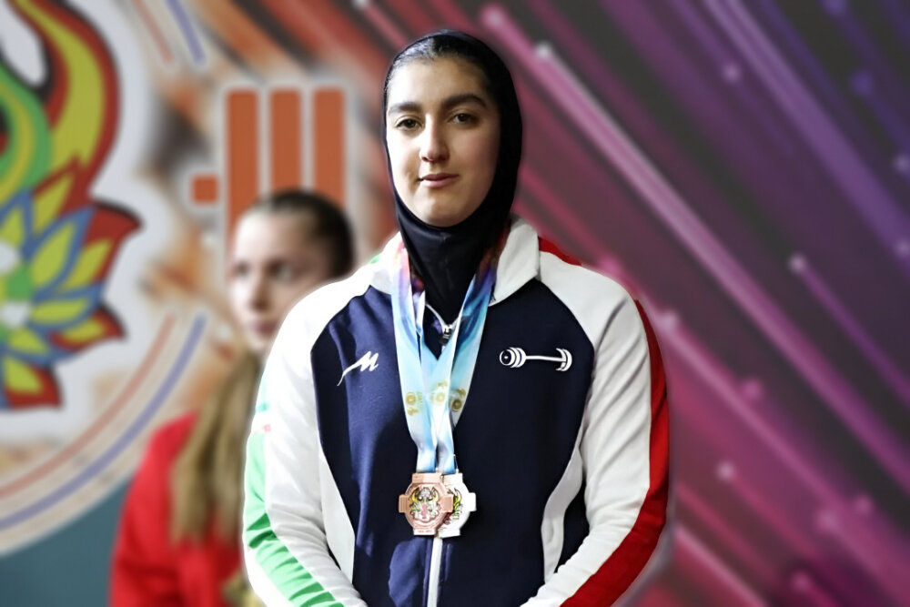 Iranian Weightlifter Shines at Peru Competitions, Snags Two Medals!